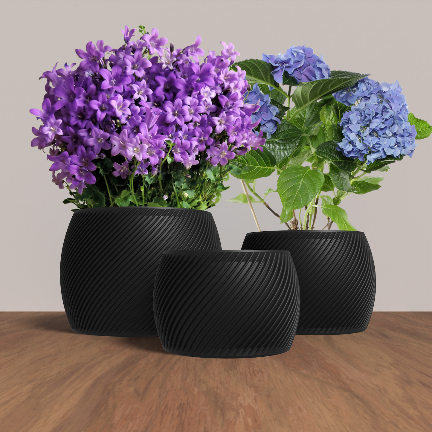 RETORTA Planter Collection - Black Rounded Planter. Buy at www.layeredfusion.com.