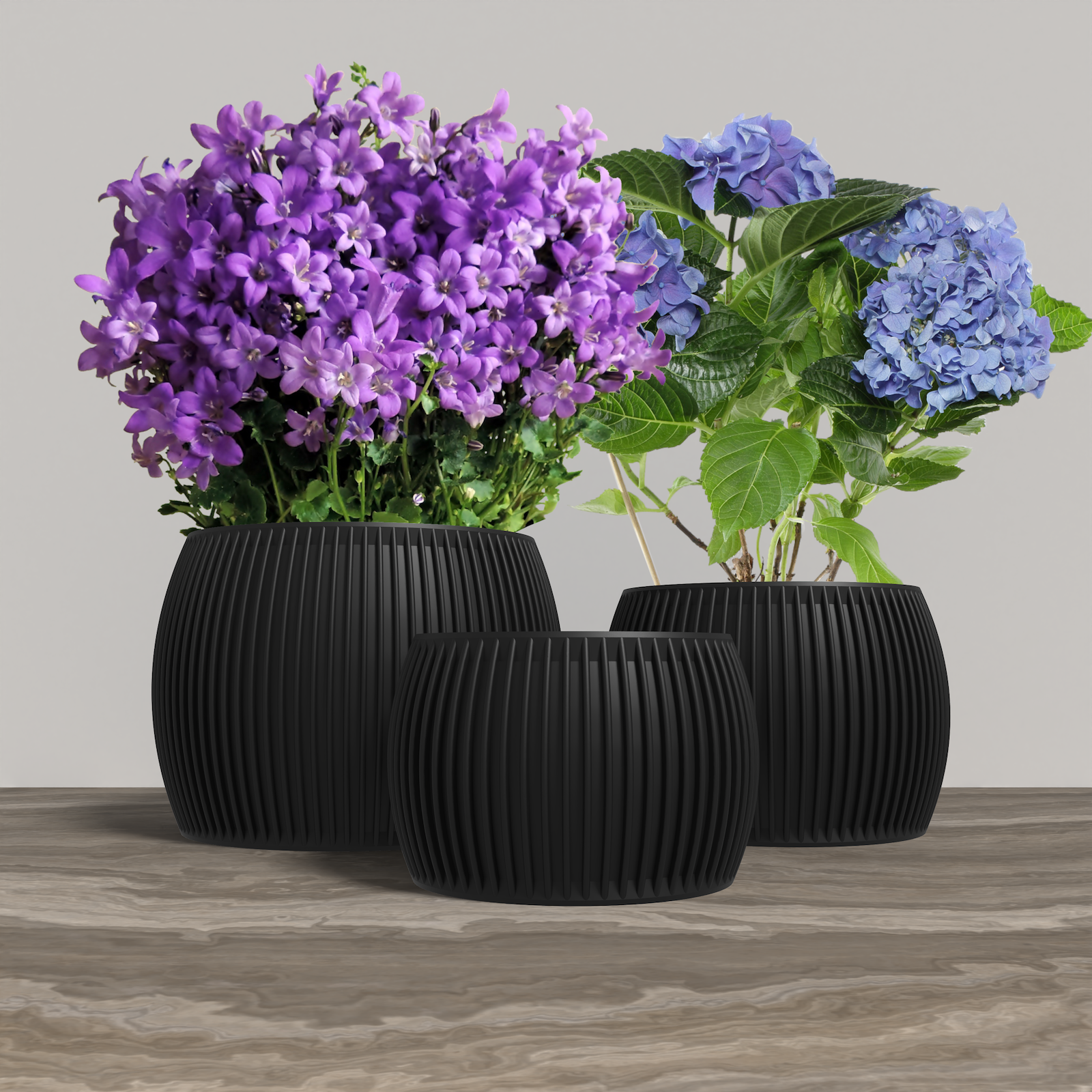 SAGITA Planter Collection - Black Rounded Planter. Buy at www.layeredfusion.com.